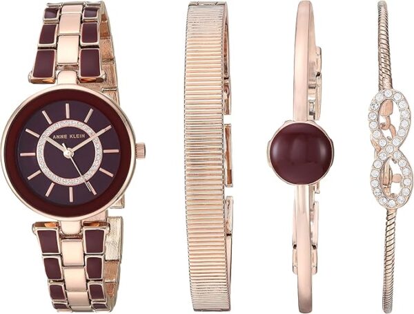 Limited time deal 74% off Anne Klein Women's Premium Crystal Accented Gold-Tone and Black Watch and Bracelet Set